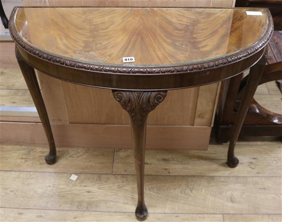 A 1930s D shaped side table W.88cm